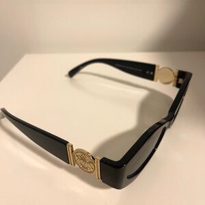 Elegant Black and Gold Sunglasses
